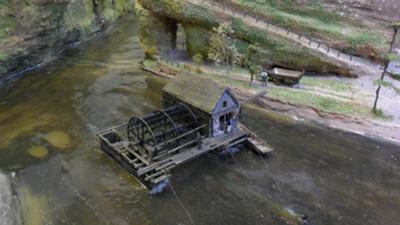 A rare model of a boat mill